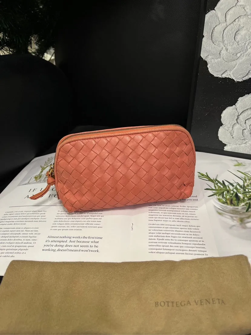 bottega veneta coral pink woven toiletry clutch